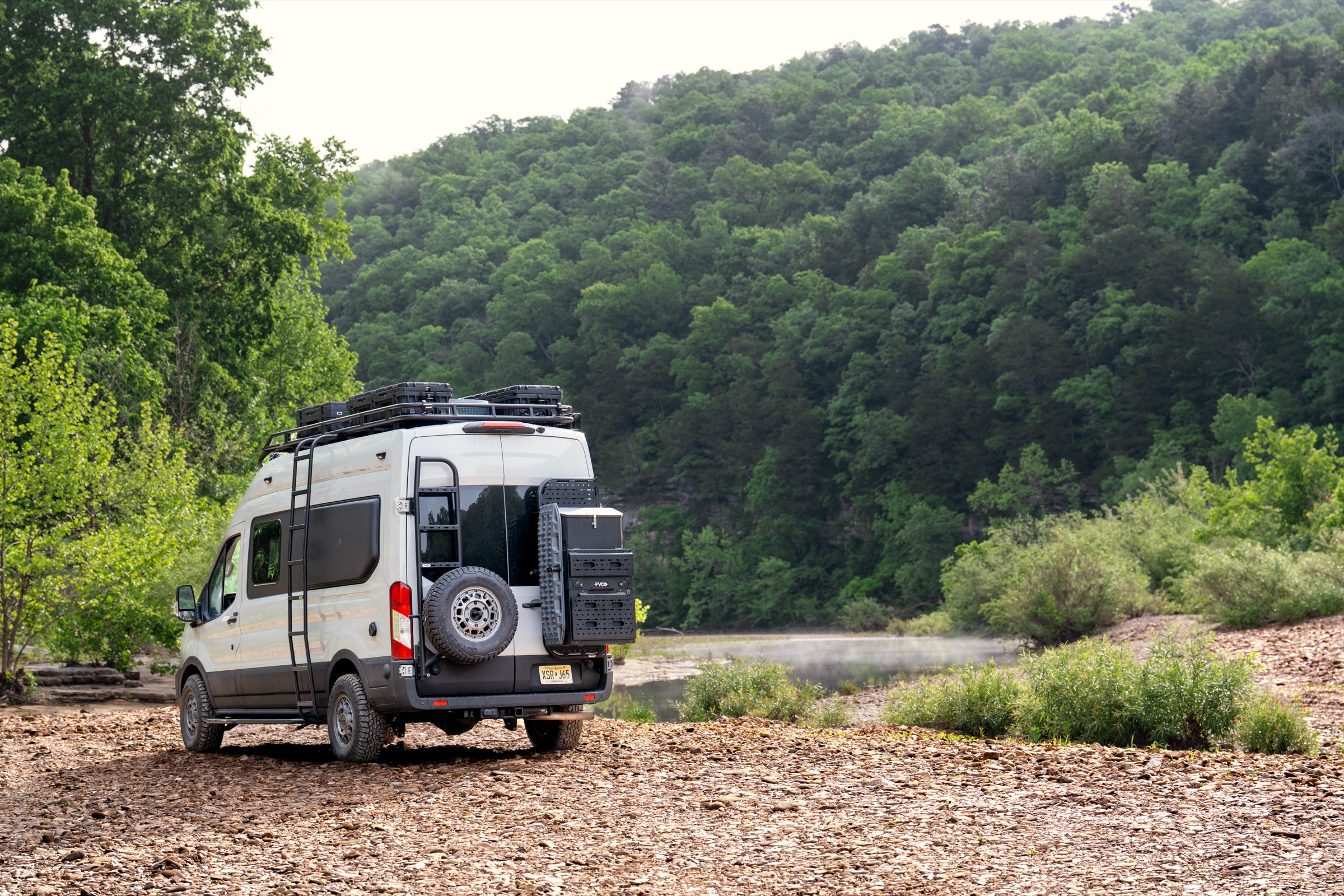 A custom Ready.Set.Van. build parked on a canyon rim